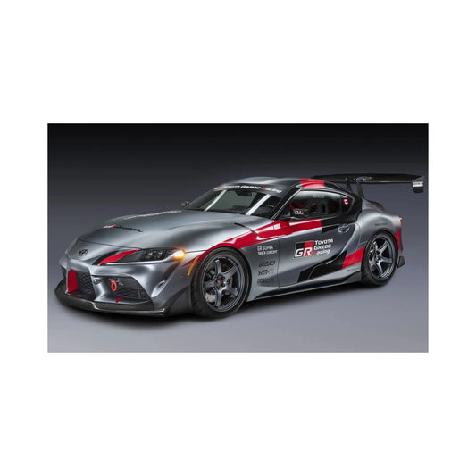 Gray Toyota GR Supra race car with red and black racing stripes and large rear spoiler