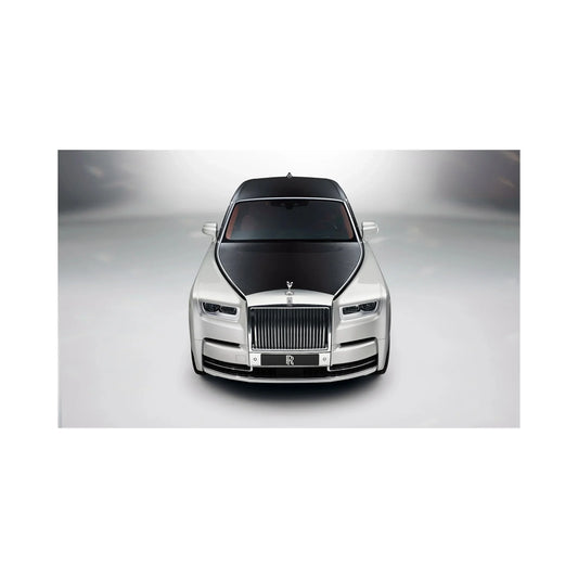 Front view of luxury two-tone Rolls-Royce car with distinctive black hood and silver body