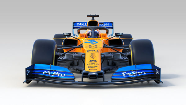 Front view of an orange and blue 2019 McLaren MCL34 Formula 1 race car with visible sponsors and aerodynamic details