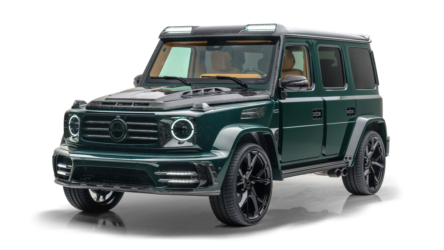 Dark green Mansory Gronos luxury SUV with black rims and tan leather interior on white background