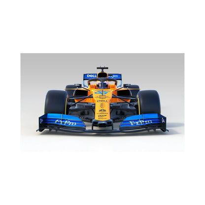 Front view of orange and blue McLaren Formula 1 race car with Dell and FxPro logos